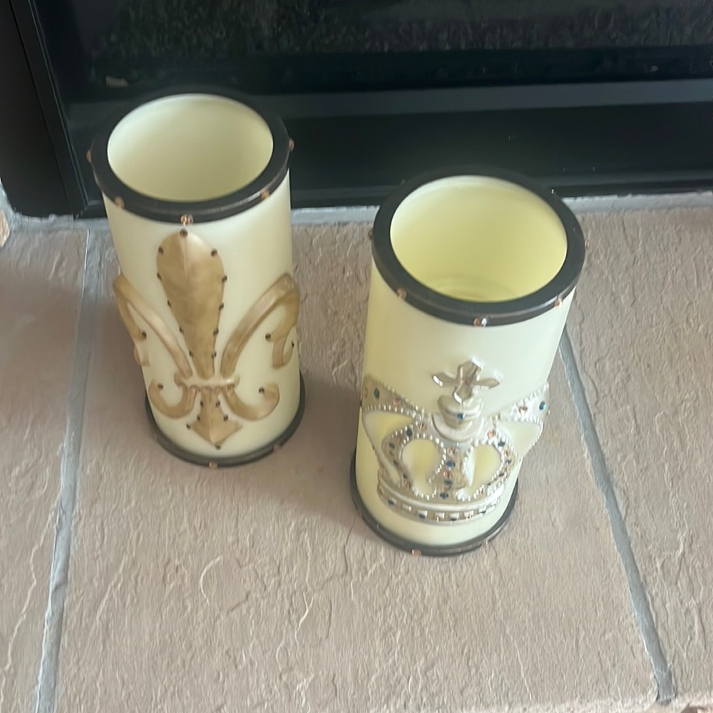 2- 11” HT 4” opening . Two wax Lanterns. Tea Candles included. 75 for both.